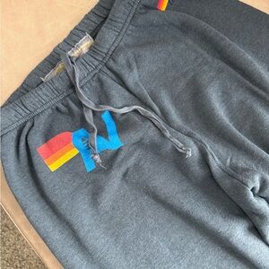 Aviator Nation Charcoal Sweatpants with Rainbow Stripe and Blue 'AN' Logo